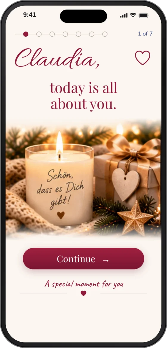 Smartphone showing the first scene of a gift moment: “Claudia, today is all about you.”